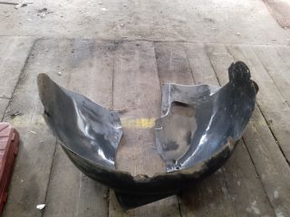 bontott VW TOURAN Bal első Dobbetét (Kerékjárati, Műanyag)