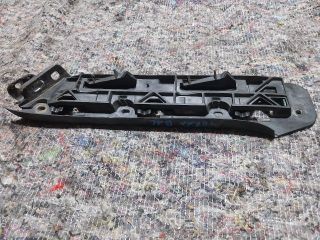 bontott VW TOURAN Bal első Lökhárító Tartó (Műanyag)