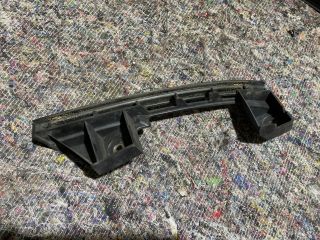 bontott VW TOURAN Bal első Lökhárító Tartó (Műanyag)