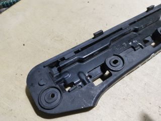 bontott VW TOURAN Bal első Lökhárító Tartó (Műanyag)