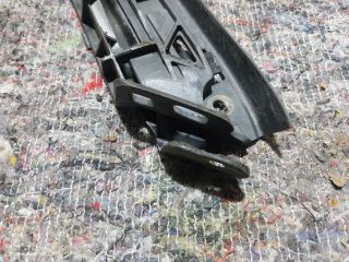 bontott VW TOURAN Bal első Lökhárító Tartó (Műanyag)