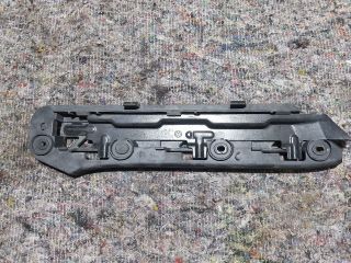 bontott VW TOURAN Bal első Lökhárító Tartó (Műanyag)