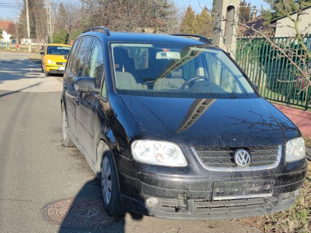 bontott VW TOURAN Bal első Zsanér