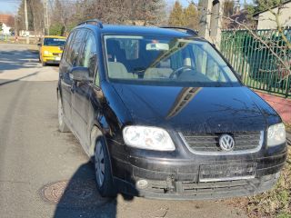 bontott VW TOURAN Bal első Zsanér