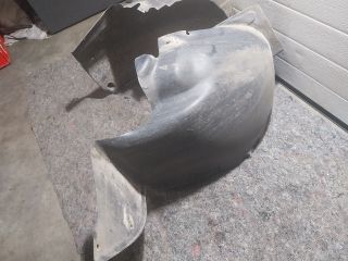 bontott VW TRANSPORTER Bal első Dobbetét (Kerékjárati, Műanyag)